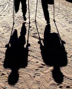 crutches, amputees, shadows