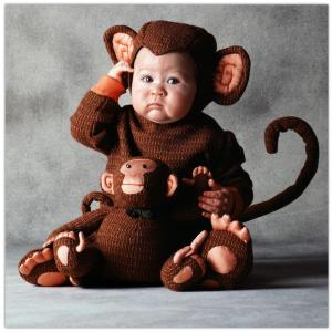 monkey kid with monkey stuffed animal