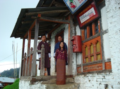 Postmistress in front of Wamrong Post Office in east Bhutan, July 2008