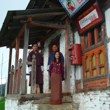 Postmistress in front of Wamrong Post Office in east Bhutan, July 2008