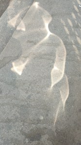 Light on a sidewalk, rue Larrey, Paris - photo by William Eaton, 2025